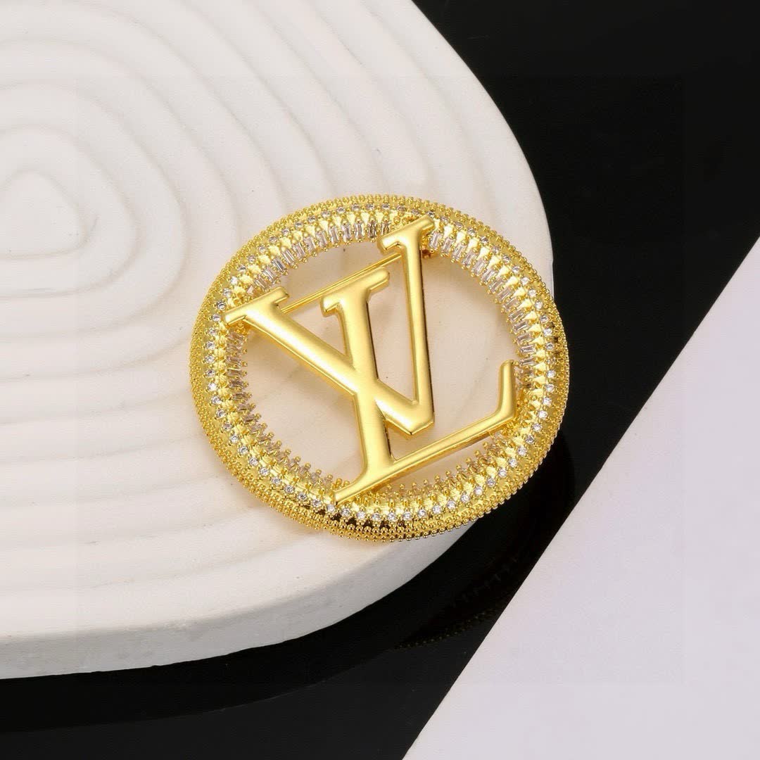 Louis Vuitton Gold Tone Logo Brooch with Rhinestones